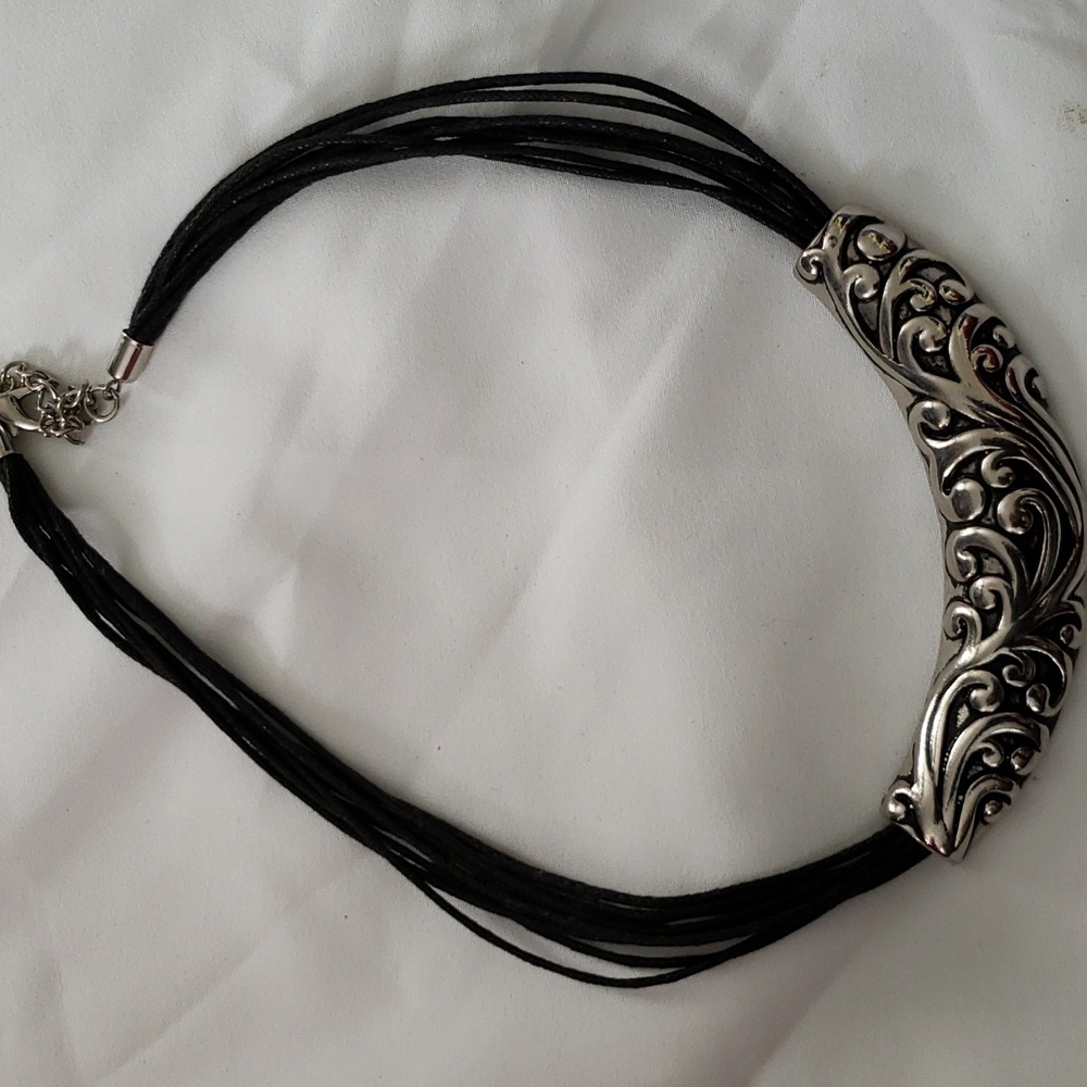 Leather and silver tone necklace